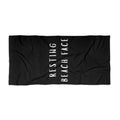 Black Beach Towel — Resting Beach Face.
